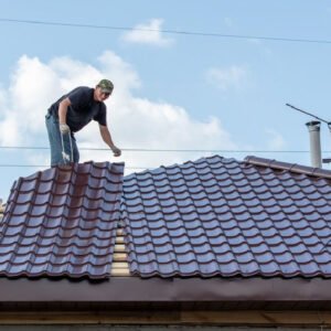 4.-Worker-Installing-Brown-UPVC-Roofing-Sheets
